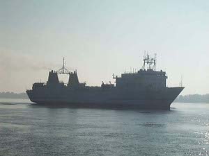 The silhouette of the freighter is seen departing Wedel