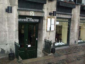 The restaurant is below street level, with stairs down to the entrance