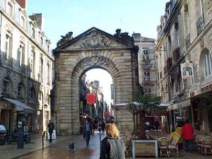 The old narrow gate still stands, with room only for one car to pass through - it has been left standing in the middle of a downtown street