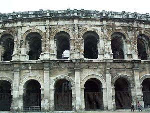 Two tall stories surrounded by curving Roman arches, arranged in a huge oval, surround the arena, which is pretty well preserved