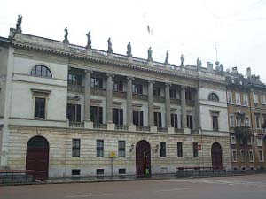 The four-story building is topped by nine statues