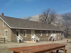 The 19th century adobe fort with steps up to the rooms is still standing