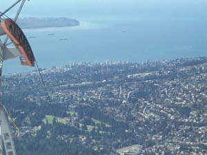 The aerial view shows North Vancouver and Vancouver Harbour