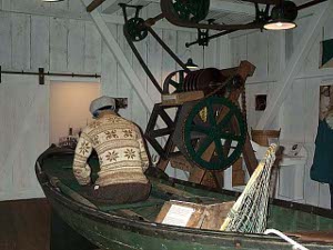 The small green rowing dory was the craft used by this old fisherman