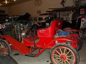 A bright red roadster is part of the display at the Fort Nelson museum