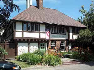 The pottery is located in a white and brown Tudor style brick building