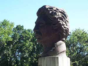 The head of Louis Rield appears almost in silhouette, due to the sun's angle