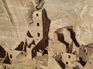 This cliff house is elaborately constructed out of stone with many stories.