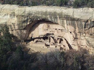 Protected from intruders and invaders, Stone House sits carved into a natural arch in the wall of a cliff at Mesa Verde
