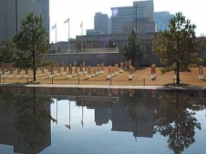 Empty chairs are arranged as a stark memorial to those killed in the bombing