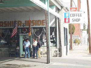 next to the car wash bays is a little hole in the wall; a sign says 'Cashier Inside'