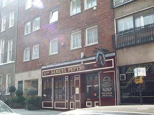 The front of the Samuel Pepys is dark Maroon with gold accents, and a photograph of Pepys is the sign