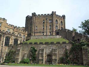 The octagonal four-story brown stone keep rises high above the castle grounds