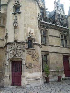 Beautiful decorations adorn the old walls of the Hotel de Cluny