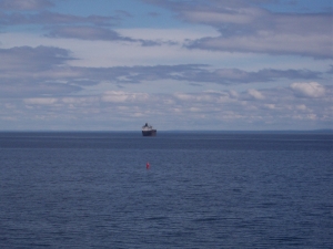 a freighter rides at anchor in Lake Superior off Duluth, Minnesota