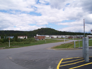 A few small homes line a residential street in Churchill Falls