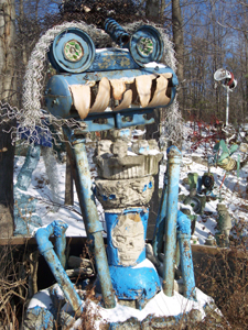 Braided wire is used for hair, hubcaps for eyes, engine parts for the body, and
pipes for the limbs; the demonic-looking figure with huge white teeth is painted
a lovely cobalt blue.