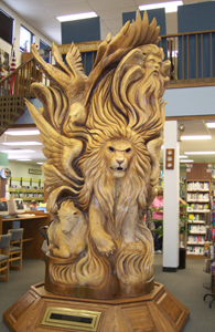 Sculpture Seraphim in Sterling Public Library.  This large vertical wooden sculpture
is almost ten feet tall, and finely carved all around.