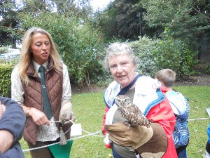 Elsa holds the owl