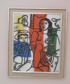 the painting resembles a black line drawing, with bright patches of color - red, yellow, blue and green